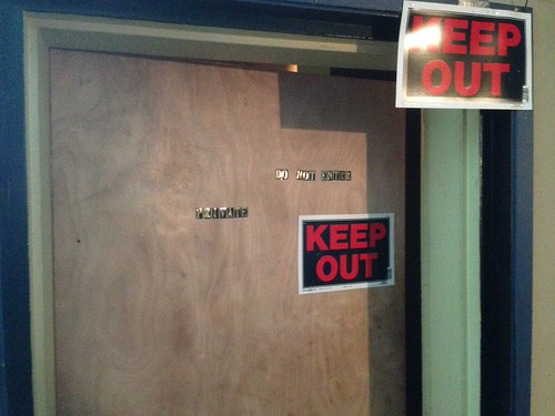 Open door marked private
